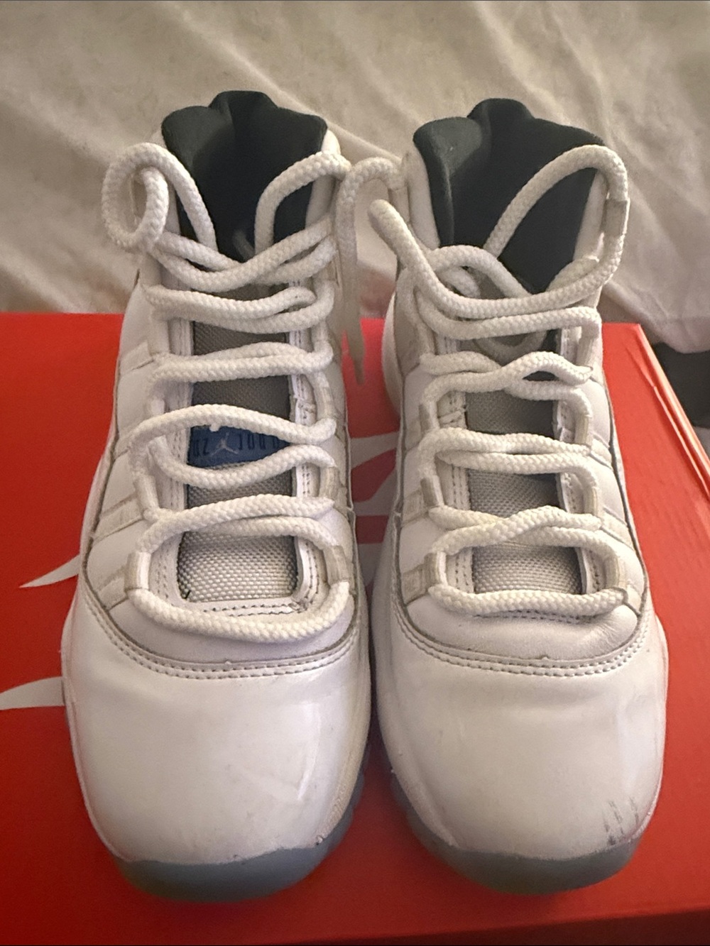 Jordan Kids White and Black High-Top Sneakers with Blue Accent